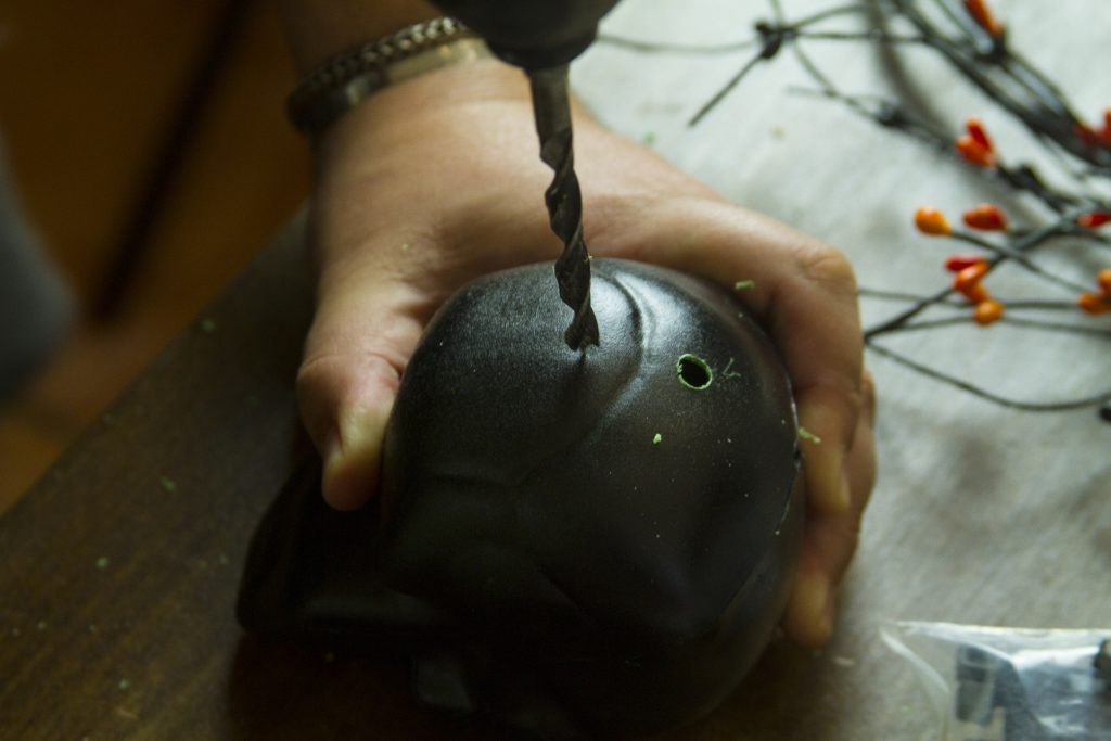 drilling hole in fake skull